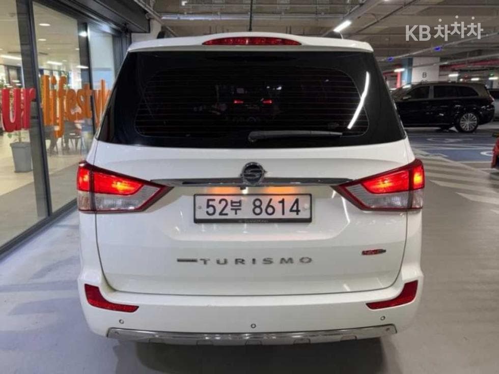 КейДжи Мобилити 코란도 투리스모9-местен 4x4 아웃도어 에디션 - 5