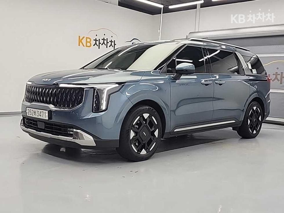 Киа The New (фейслифт) Канивал Хибрид 4-то поколение 1.6 HEV 9-местен Signature - Image 1