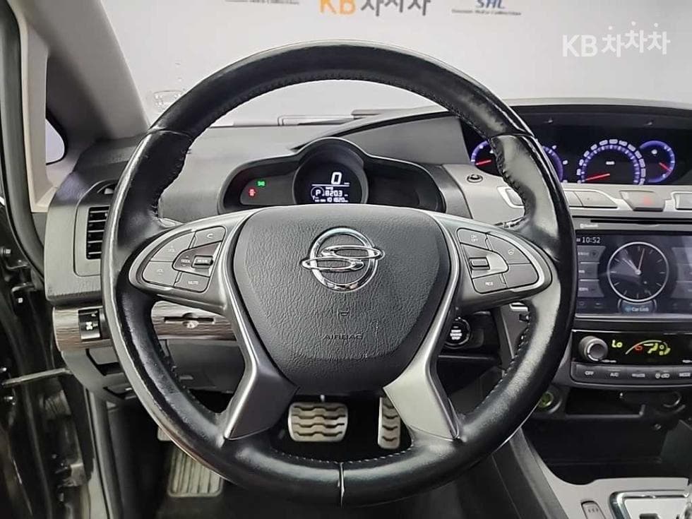 КейДжи Мобилити 코란도 투리스모9-местен 2WD RX - 9