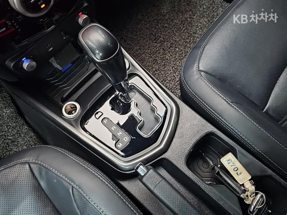 КейДжи Мобилити Тиволи AirБензин 2WD RX - 8