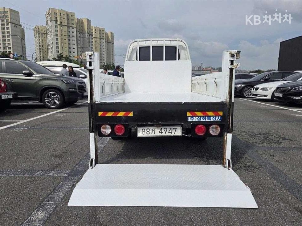 Киа The New (фейслифт) Бонго 3 (лек)파워게이트 1 тон 수직형(2단) Королевска кабина Удължено междуосие L - 6
