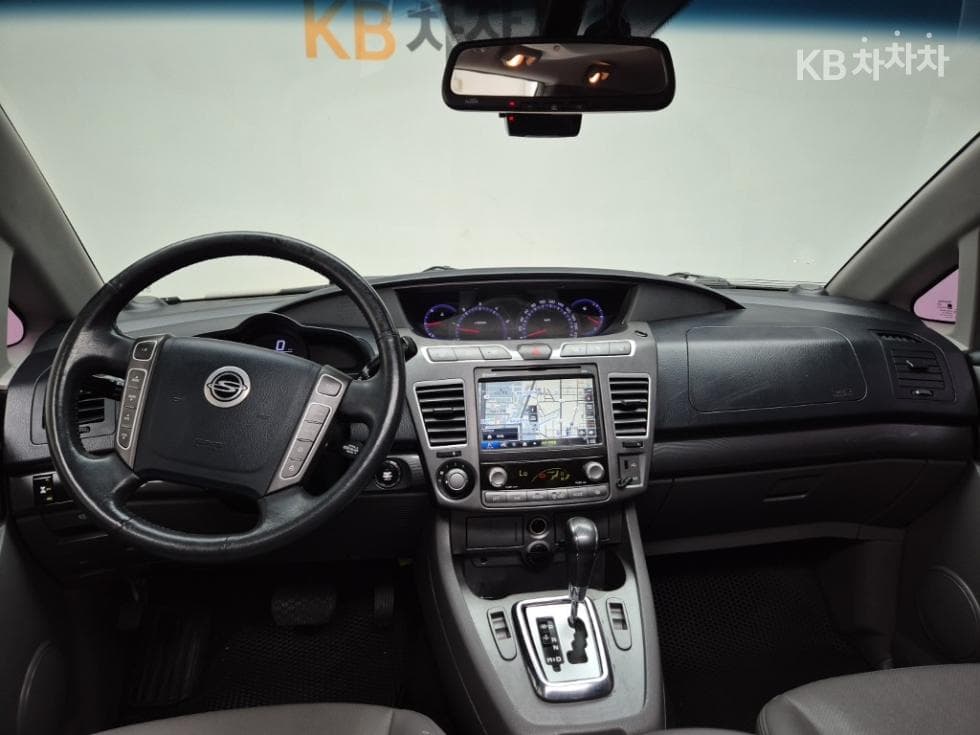 КейДжи Мобилити 코란도 투리스모4x4 GT 9-местен - 7