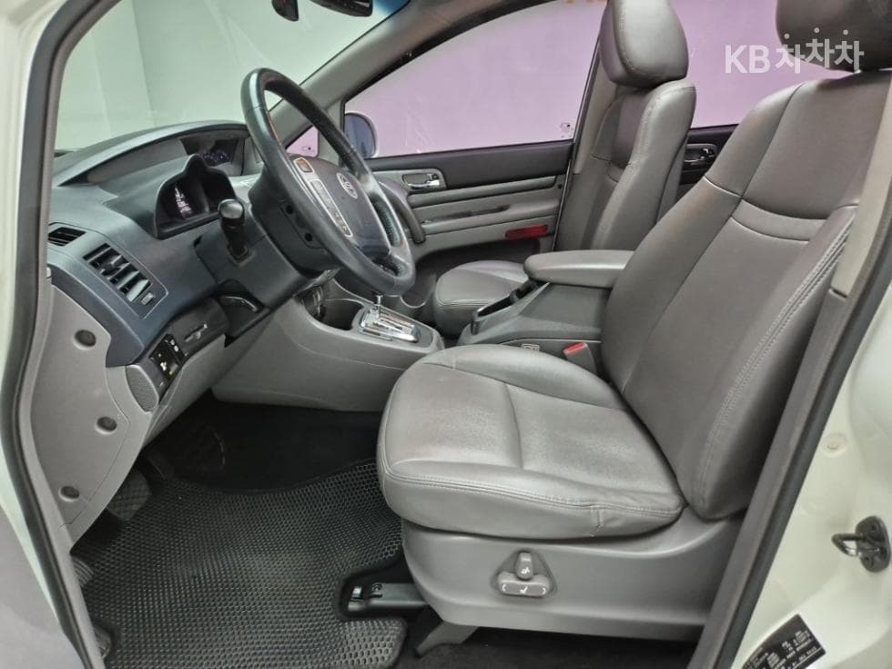 КейДжи Мобилити 코란도 투리스모4x4 GT 9-местен - 11