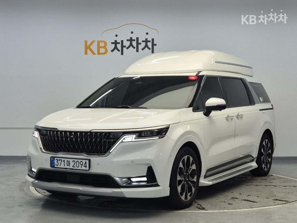 Киа Канивал 4-то поколение Висок Лимузин (Канивал) G3.5 GDI 9-местен Signature - Image 1