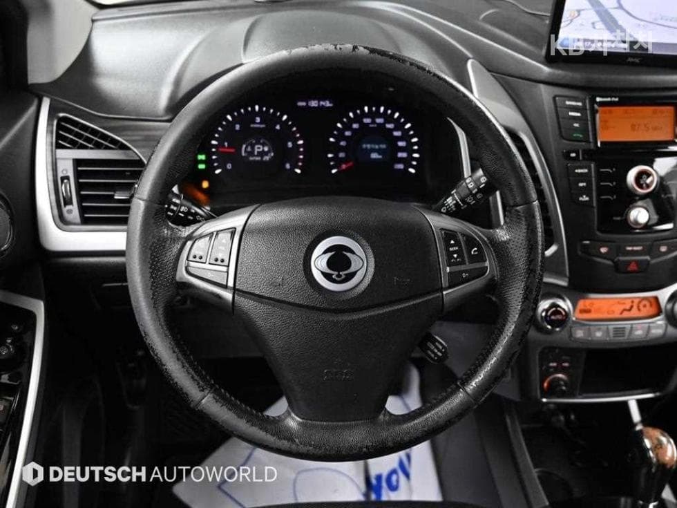 КейДжи Мобилити Нов코란도 C2.0 어드벤처 60th 에디션 2WD - 13