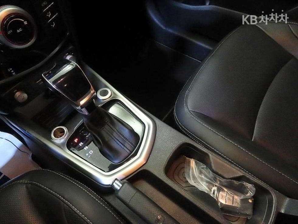 КейДжи Мобилити Тиволи 아머1.6 Бензин TX 2WD - 13