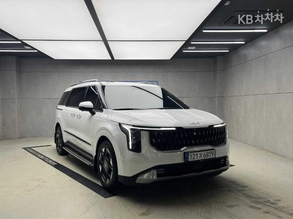 Киа The New (фейслифт) Канивал Хибрид 4-то поколение 1.6 HEV 7-местен (Лимузин) 아웃도어 - Image 1