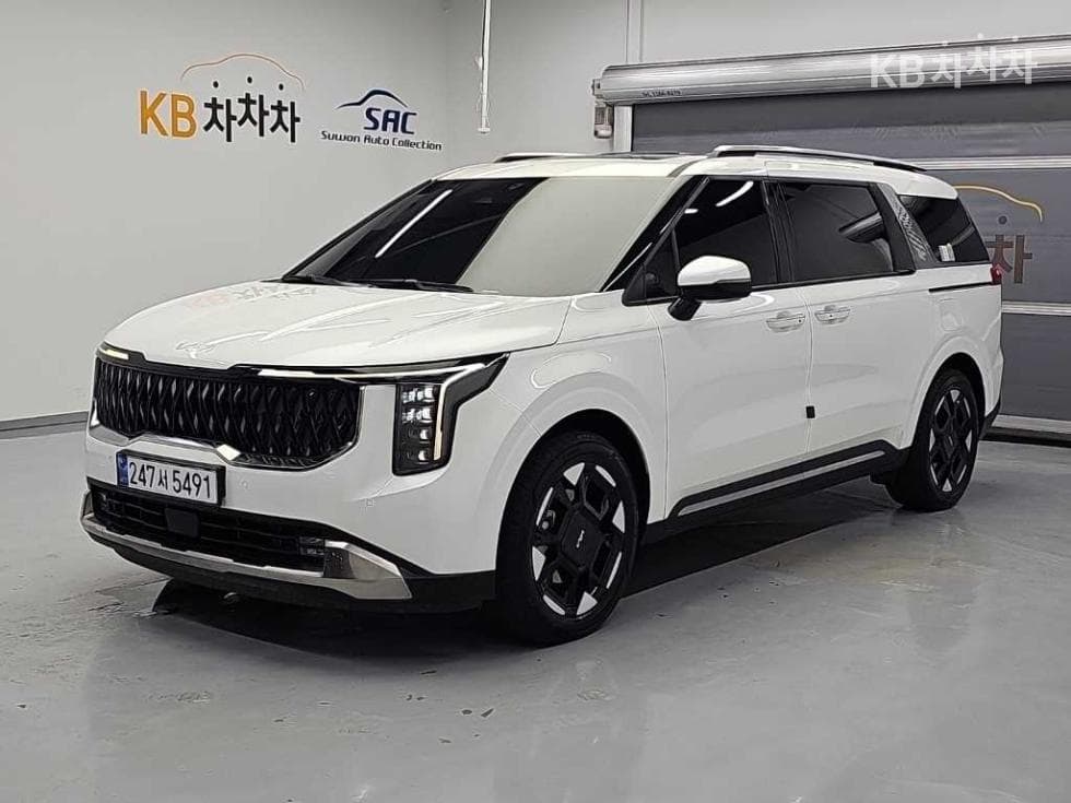 Киа The New (фейслифт) Канивал Хибрид 4-то поколение 1.6 HEV 9-местен Noblesse - Image 1
